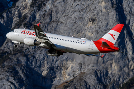 Austrian Airlines Airbus A320 in roter Lackierung mit weißem Heck beim Start - Austrian Handgepäck Maße und Tarife 2026