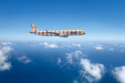 Condor Airbus A321 in der gelb gestreiften Sunshine-Lackierung im Flug - Condor Handgepäck Maße und Tarife 2026